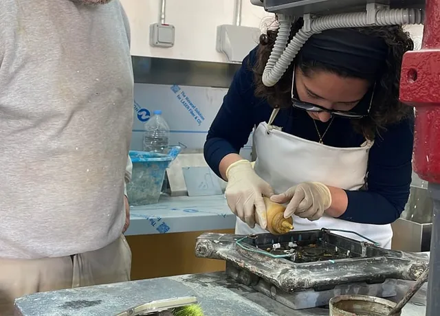A participant pressing a tile under guidance